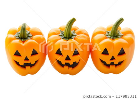 Orange bell peppers carved with jack-o'-lantern faces isolated on a white background, depicting a Halloween theme with a playful twist Orange bell peppers carved with jack-o'-lantern faces isolated on a white background, depicting a Halloween theme with a playful twist 117995311