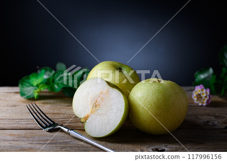 Crispy texture of Nijisseiki pear (black background) Crispy texture of Nijisseiki pear (black background) 117996156