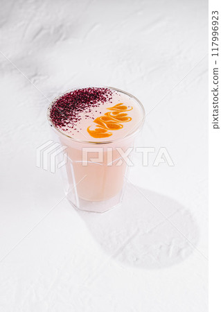 Pink moon milk beverage standing on white background casting shadow Pink moon milk beverage standing on white background casting shadow 117996923