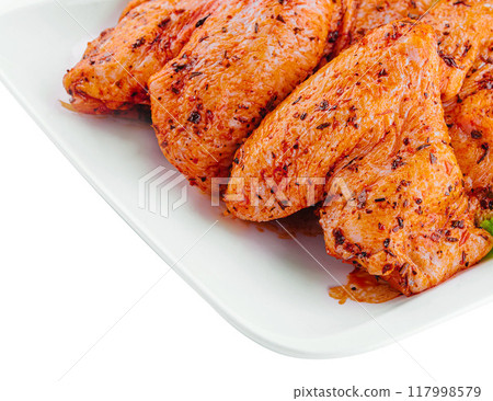 Marinated grilled chicken breast on plate Marinated grilled chicken breast on plate 117998579