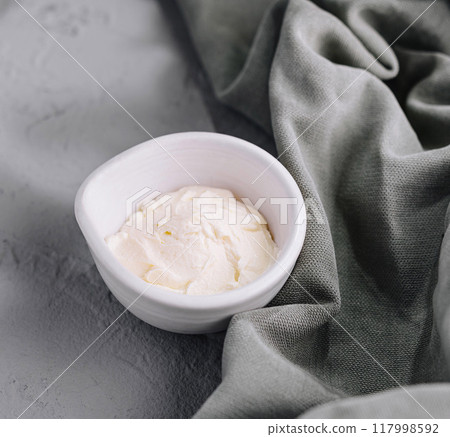 Elegant bowl of fresh mascarpone cheese 117998592
