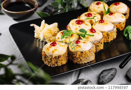 Elegant sushi platter with garnish Elegant sushi platter with garnish 117998597