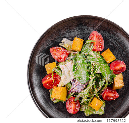 Fresh garden salad on a black plate 117998812