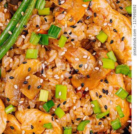 Savory asian fried rice dish macro background 117998892
