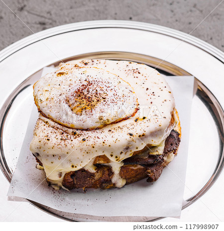 Gourmet lasagna slice on elegant plate Gourmet lasagna slice on elegant plate 117998907