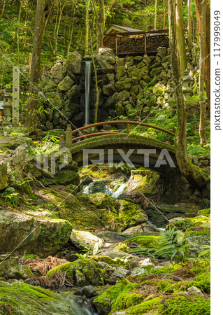 A view of the stream flowing through the Amanoiwato cave and the temple grounds in Isobe-cho, Shima City, Mie Prefecture A view of the stream flowing through the Amanoiwato cave and the temple grounds in Isobe-cho, Shima City, Mie Prefecture 117999049