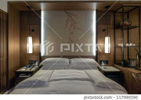 A room at night at the Ritz-Carlton Reserve, Higashiyama Niseko Village, a luxury resort hotel in Niseko, Hokkaido 117999390