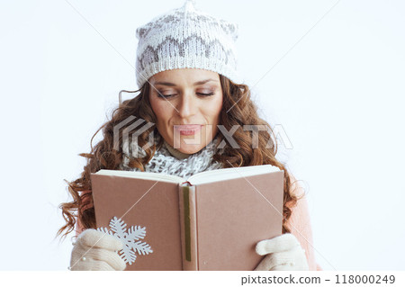 trendy woman in sweater, mittens, hat and scarf 118000249