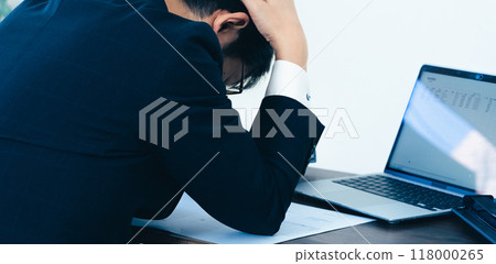 Male businessman scanning documents 118000265