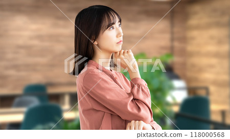 Young business woman thinking Young business woman thinking 118000568