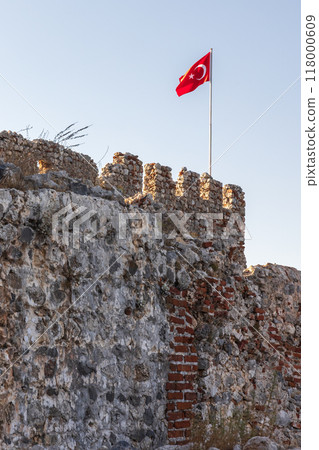 Turkish flag is on top of the fortress of Alanya Kale Turkish flag is on top of the fortress of Alanya Kale 118000609