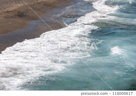 Shore water with waves and white foam Shore water with waves and white foam 118000617