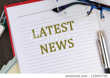Conceptual latest news symbol. Copy space. LATEST NEWS message written there is a memo for analysis in the business notebook Conceptual latest news symbol. Copy space. LATEST NEWS message written there is a memo for analysis in the business notebook 118001799