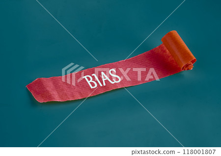 Business bias concept. BIAS on an unfolded piece of paper 118001807