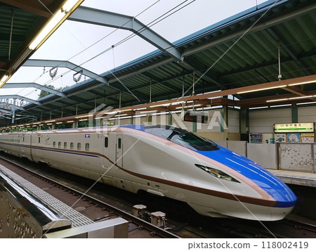 E7/W7 series Shinkansen passing through Annaka-Haruna Station on the Hokuriku Shinkansen E7/W7 series Shinkansen passing through Annaka-Haruna Station on the Hokuriku Shinkansen 118002419