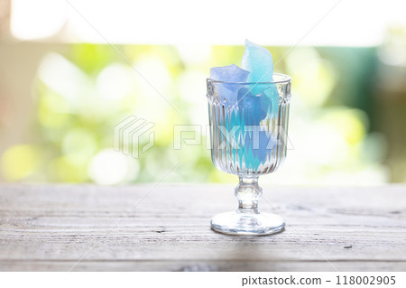 Amber sugar in a glass Amber sugar in a glass 118002905