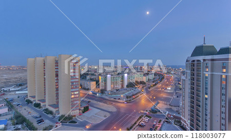 Aktau city after sunset on the shore of the Caspian Sea day to night timelapse. Kazakhstan. 118003077