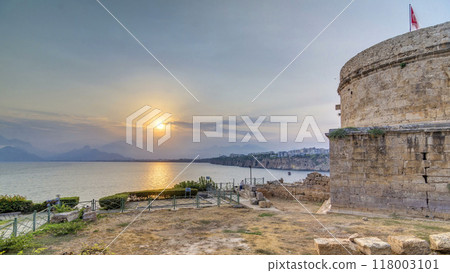 Hidirlik tower in Kas town in Turkey timelapse with view of harbor marine bay is a old city 118003101
