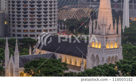 St. Andrew's Cathedral aerial day to night timelapse. It is an Anglican cathedral in Singapore, the country's largest cathedral. 118003182