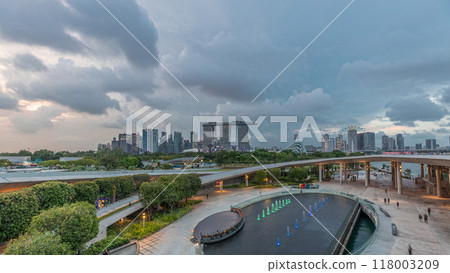 Aerial view after sunset with Singapore city skyline view from Marina barrage garden day to night timelapse. 118003209