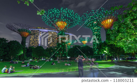 Futuristic view of amazing illumination at Garden by the Bay night timelapse hyperlapse in Singapore. 118003211