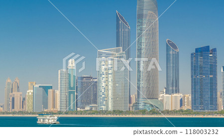 View of high skyscrapers on a corniche in Abu Dhabi stretching alongside the business center timelapse hyperlapse. 118003232