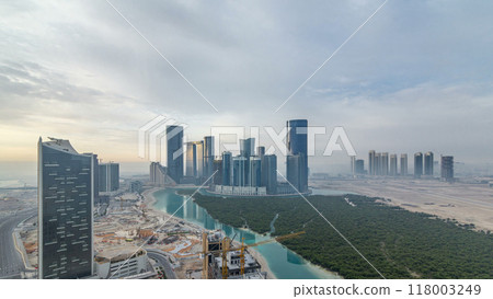Buildings on Al Reem island in Abu Dhabi timelapse from above 118003249