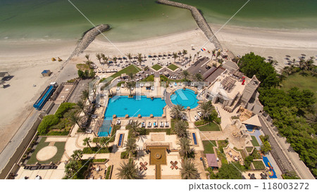 Beautiful area of beach in Ajman timelapse near the turquoise waters of Arabian Gulf. 118003272