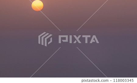 Sunrise close up view over Dubai skyline in the morning, aerial top view from downtown timelapse. 118003345