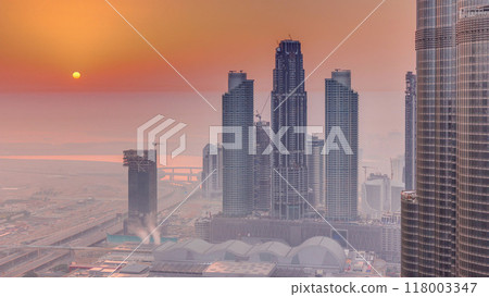 Amazing sunrise aerial view of Dubai downtown skyscrapers morning timelapse, Dubai, United Arab Emirates 118003347