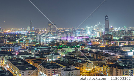 Aerial view of neighborhood Deira with typical buildings night timelapse, Dubai, United Arab Emirates Aerial view of neighborhood Deira with typical buildings night timelapse, Dubai, United Arab Emirates 118003362