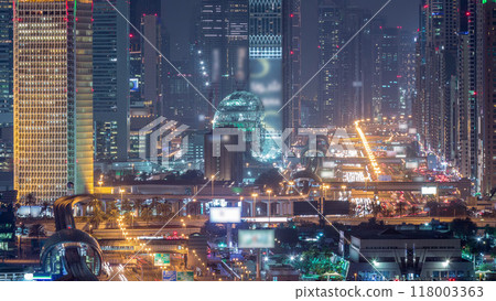 Dubai skyline with beautiful city center lights and Sheikh Zayed road traffic night timelapse, Dubai, United Arab Emirates Dubai skyline with beautiful city center lights and Sheikh Zayed road traffic night timelapse, Dubai, United Arab Emirates 118003363