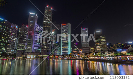 Singapore quay with tall skyscrapers in the central business district on Boat Quay night timelapse hyperlapse Singapore quay with tall skyscrapers in the central business district on Boat Quay night timelapse hyperlapse 118003381