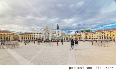 Triumphal arch at Rua Augusta and bronze statue of King Jose I at Commerce square timelapse hyperlapse in Lisbon, Portugal. 118003476