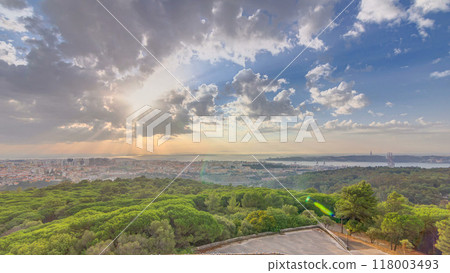 Panoramic sunrise view over Lisbon and Almada from a viewpoint in Monsanto morning timelapse. Panoramic sunrise view over Lisbon and Almada from a viewpoint in Monsanto morning timelapse. 118003493