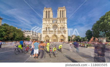 Front facade of cathedral of Notre Dame de Paris, with square full of people in front timelapse hyperlapse Front facade of cathedral of Notre Dame de Paris, with square full of people in front timelapse hyperlapse 118003505