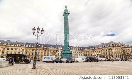 Vendome column with statue of Napoleon Bonaparte on the Place Vendome timelapse hyperlapse. Paris, France. 118003541