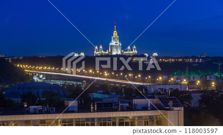 Night cityscape view of Moscow timelapse. View from rooftop to the main building of Moscow State University at night 118003597