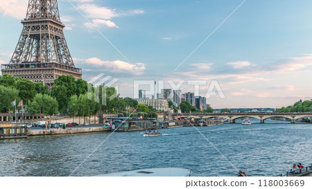 Eiffel tower and Jena bridge over Seine river evening to night timelapse, Paris, France Eiffel tower and Jena bridge over Seine river evening to night timelapse, Paris, France 118003669