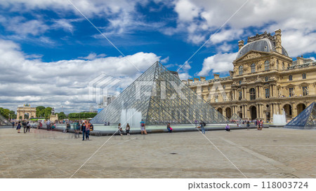 The large glass pyramid and the main courtyard of the Louvre Museum timelapse hyperlapse. Paris, France The large glass pyramid and the main courtyard of the Louvre Museum timelapse hyperlapse. Paris, France 118003724