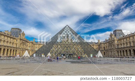 Large glass pyramid and the main courtyard of the Louvre Museum timelapse hyperlapse. Paris, France Large glass pyramid and the main courtyard of the Louvre Museum timelapse hyperlapse. Paris, France 118003727