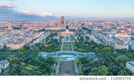 Aerial view of a large city skyline at sunset timelapse. Top view from the Eiffel tower. Paris, France. 118003750