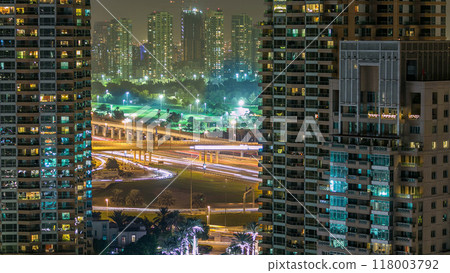 Golf field timelapse from top at night time with traffic on sheikh zayed road. 118003792
