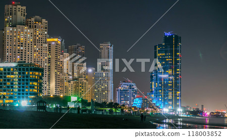 Modern skyscrapers night timelapse in Jumeirah beach residence in Dubai, JBR 118003852