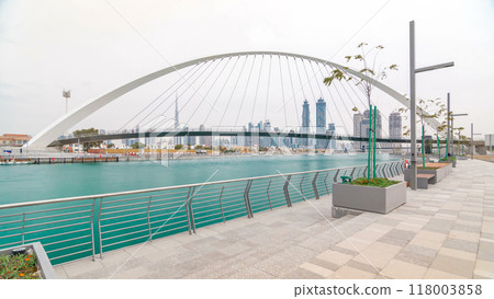 Pedestrian Bridge over the Dubai Water Canal day timelapse, United Arab Emirates 118003858