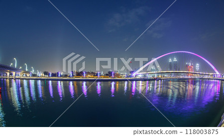 Pedestrian Bridge over the Dubai Water Canal day to night timelapse, United Arab Emirates Pedestrian Bridge over the Dubai Water Canal day to night timelapse, United Arab Emirates 118003875