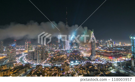 Dubai Burj Khalifa New Year fireworks celebration timelapse and the Fire accident at Dubai, UAE. Dubai Burj Khalifa New Year fireworks celebration timelapse and the Fire accident at Dubai, UAE. 118003957