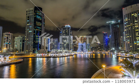 Dubai Marina towers and canal in Dubai night timelapse hyperlapse 118003971