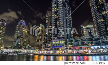 Dubai Marina towers and canal in Dubai night timelapse hyperlapse Dubai Marina towers and canal in Dubai night timelapse hyperlapse 118003997