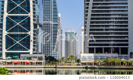 Residential buildings in Jumeirah Lake Towers timelapse in Dubai, UAE. Residential buildings in Jumeirah Lake Towers timelapse in Dubai, UAE. 118004013